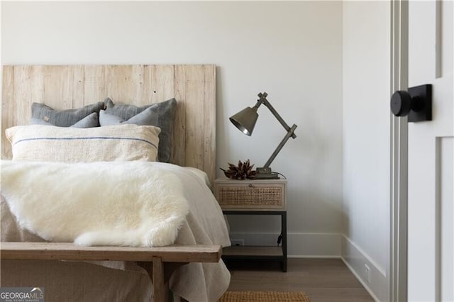 bedroom with hardwood / wood-style flooring and ceiling fan