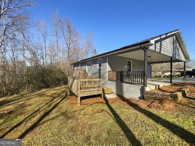 view of property exterior featuring a porch and a yard