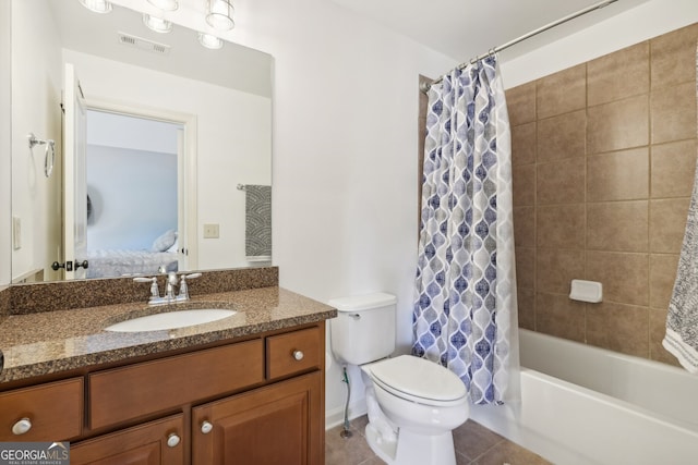 full bathroom featuring tile patterned flooring, vanity, shower / bath combination with curtain, and toilet