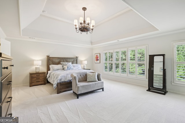 bedroom featuring a notable chandelier, a raised ceiling, and light carpet