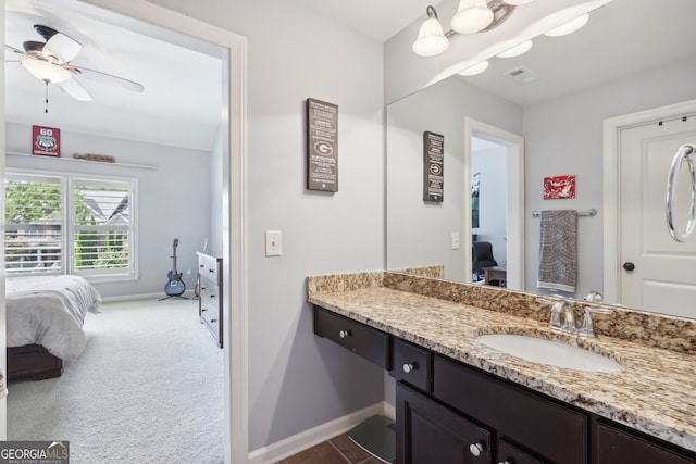 bathroom featuring ceiling fan and vanity