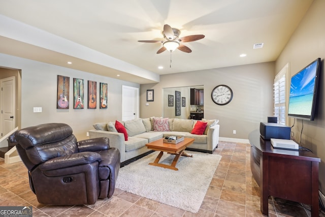 living room featuring ceiling fan