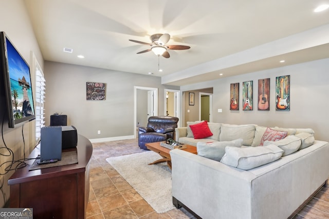 living room featuring ceiling fan