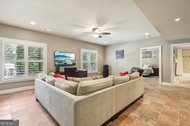 living room featuring ceiling fan