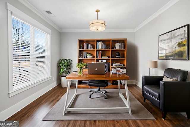 home office featuring dark hardwood / wood-style floors and ornamental molding