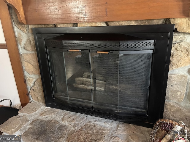 interior details with a fireplace