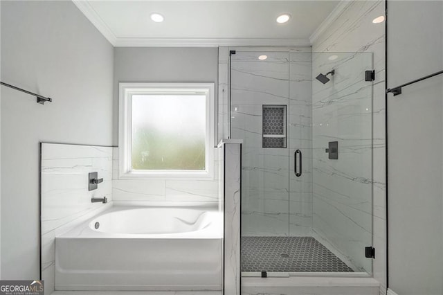 bathroom featuring plus walk in shower and ornamental molding