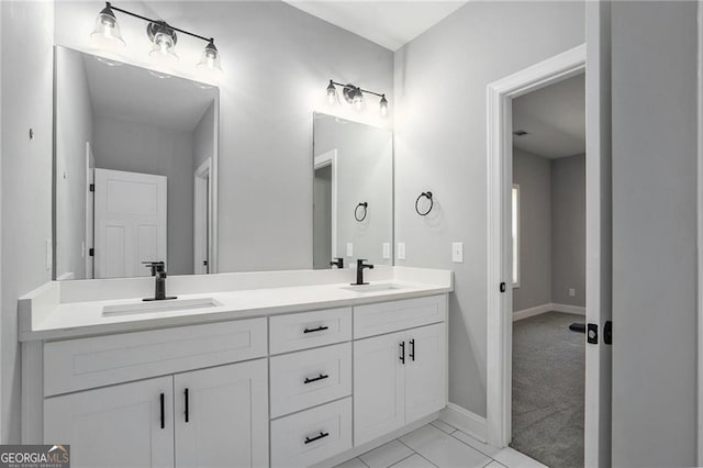 bathroom with vanity and tile patterned floors