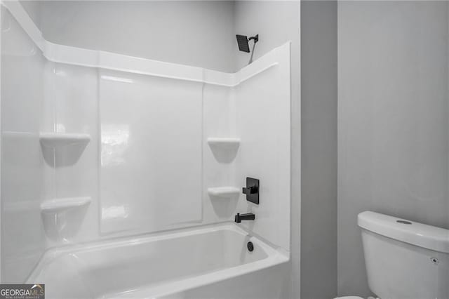 bathroom with  shower combination and toilet