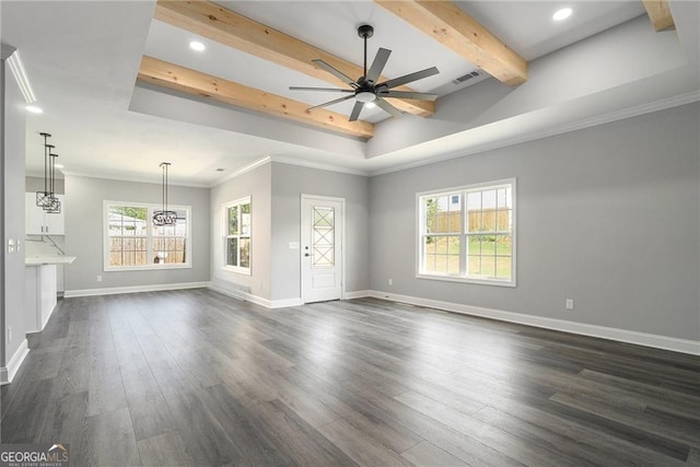 unfurnished living room with beamed ceiling, dark hardwood / wood-style flooring, ceiling fan, and ornamental molding