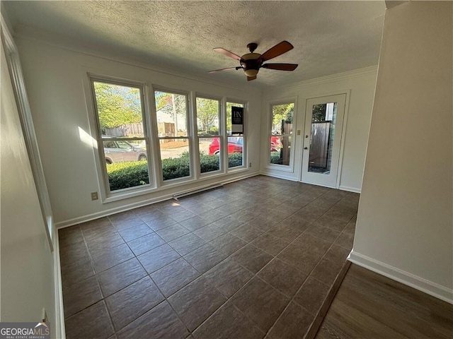 unfurnished room featuring ceiling fan and a textured ceiling