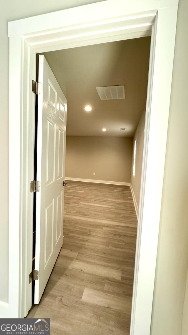 hall featuring light hardwood / wood-style floors