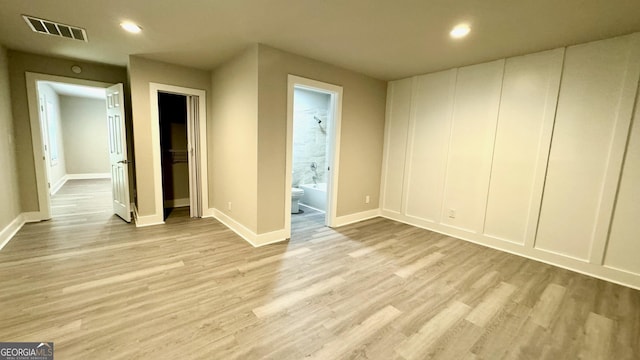 unfurnished room featuring light wood-type flooring