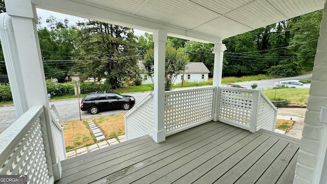 wooden deck featuring a porch