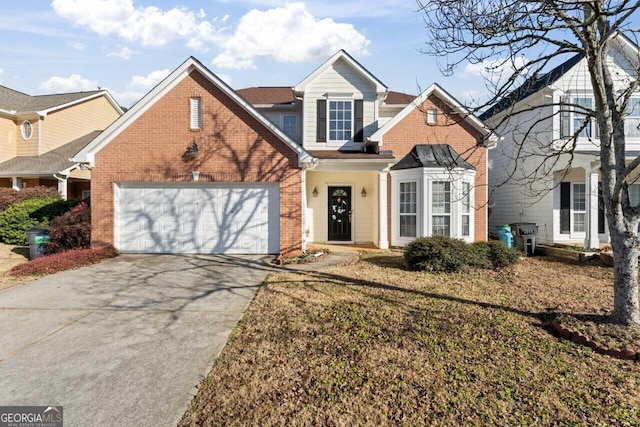 view of property featuring a front yard and a garage