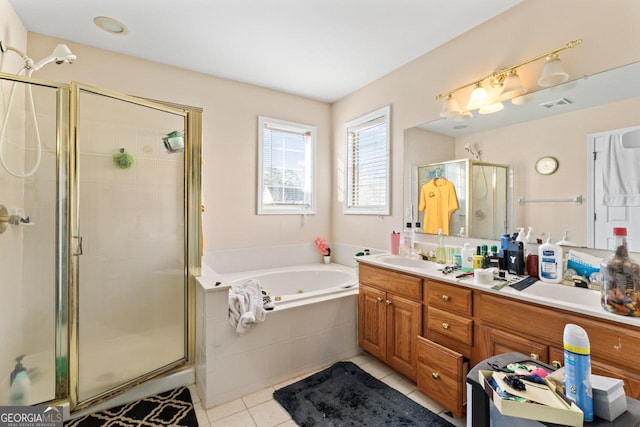 bathroom featuring tile patterned flooring, vanity, and independent shower and bath