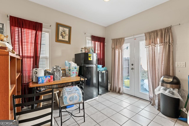 interior space featuring a healthy amount of sunlight and french doors