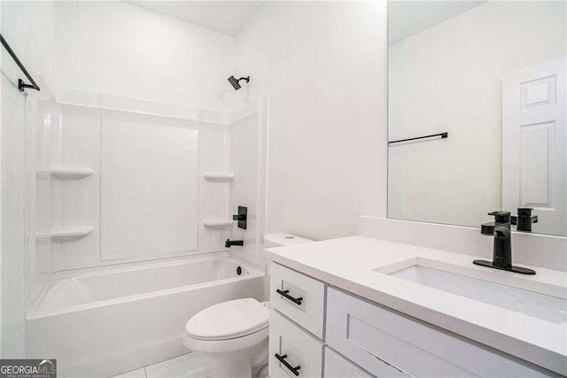 full bathroom with washtub / shower combination, vanity, and toilet