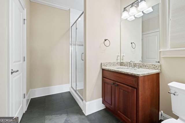 bathroom featuring vanity, toilet, ornamental molding, and walk in shower