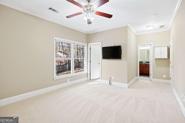 interior space featuring ceiling fan and ornamental molding