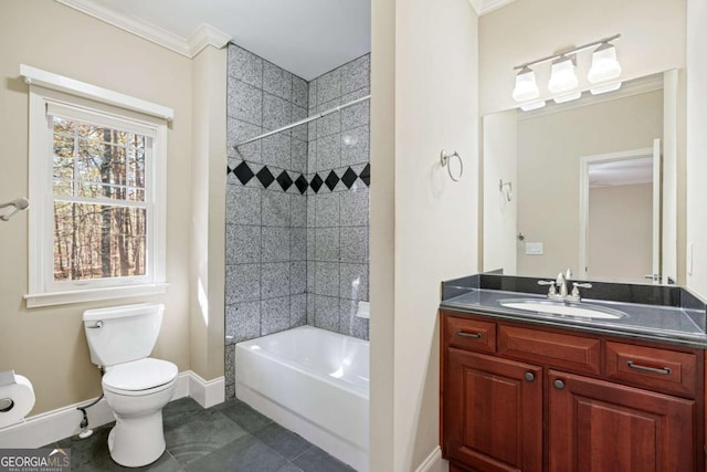 full bathroom featuring tile patterned floors, vanity, tiled shower / bath combo, crown molding, and toilet