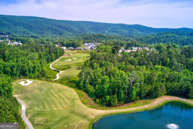 bird's eye view with a water and mountain view