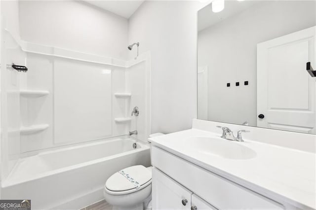 full bathroom with vanity, toilet, and bathtub / shower combination