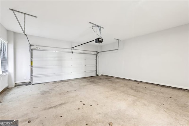 garage featuring a garage door opener