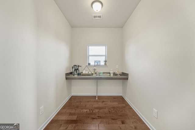 interior space with dark hardwood / wood-style floors