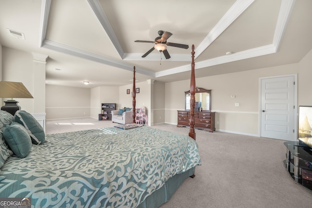 bedroom with ceiling fan, crown molding, and a tray ceiling