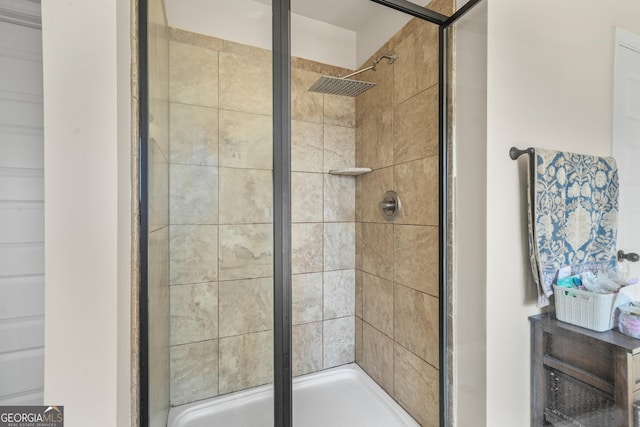 bathroom with a shower with shower door