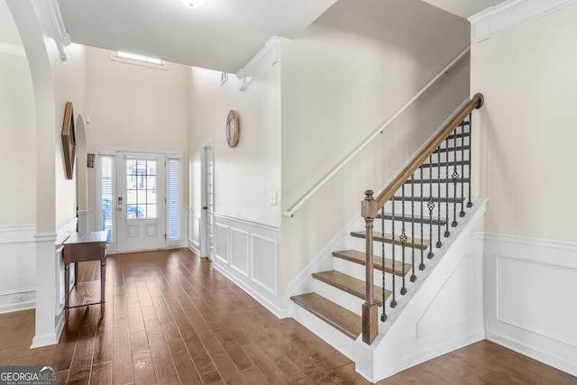 entrance foyer featuring dark hardwood / wood-style flooring