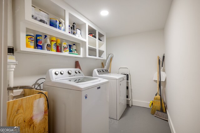 laundry room with sink and washing machine and clothes dryer