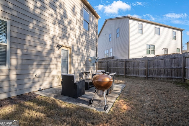 rear view of house with a patio