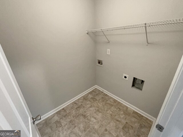 laundry room featuring hookup for a washing machine and electric dryer hookup