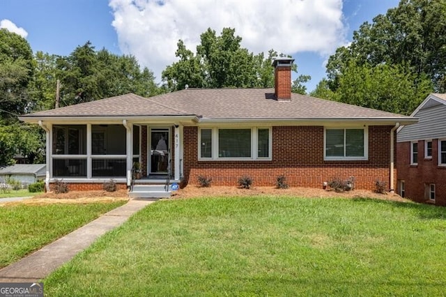 ranch-style home with a front yard