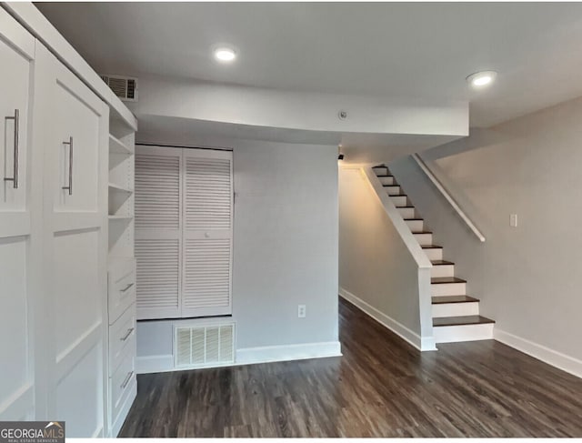 interior space with dark wood-type flooring