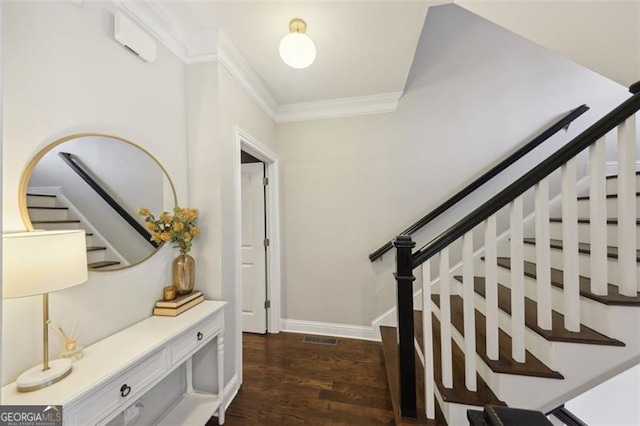 interior space featuring dark hardwood / wood-style flooring and ornamental molding