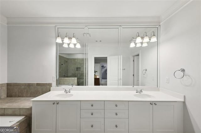 bathroom featuring vanity, a shower with door, and ornamental molding