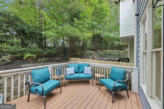 deck featuring an outdoor living space