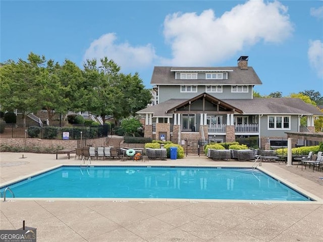 view of pool featuring a patio area