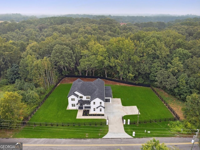 birds eye view of property featuring a rural view