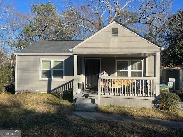 view of front of property featuring covered porch