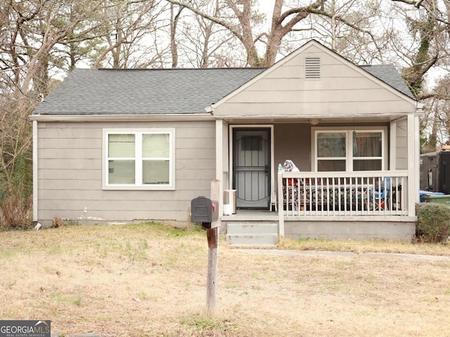 view of front of property featuring covered porch