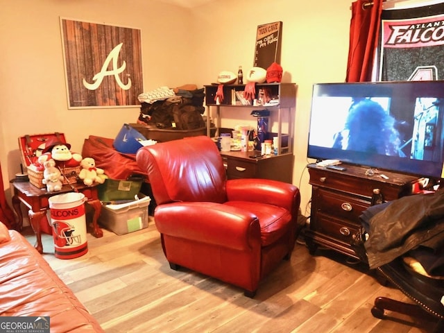 living area with light hardwood / wood-style floors