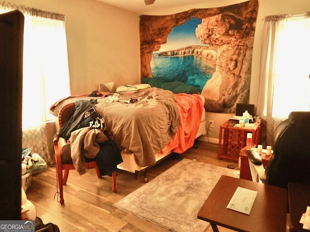 bedroom featuring light wood-type flooring