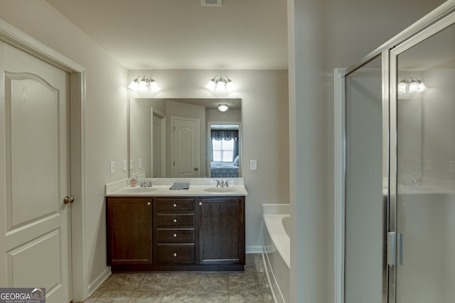 bathroom featuring plus walk in shower and vanity