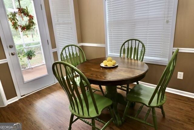 dining room featuring dark hardwood / wood-style flooring