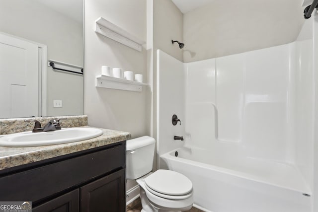 full bathroom featuring vanity, toilet, and shower / washtub combination