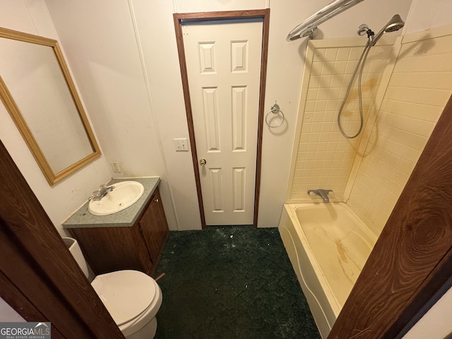 full bathroom featuring vanity, toilet, and tiled shower / bath